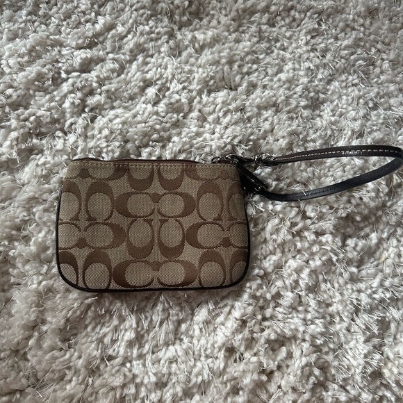 EUC Coach Signature Wristlet Brown w/ purple inside - Picture 2 of 4